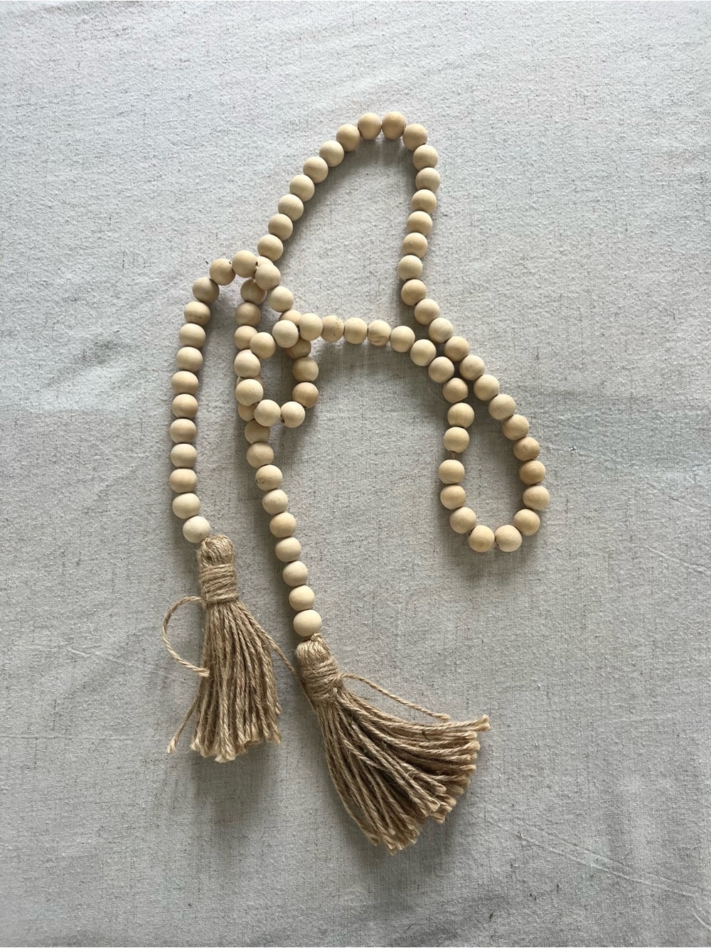 Natural Wood Bead Garland with Jute Tassels - 58" Long